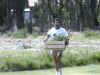 Gonzalo Igor bringing food for the rabbits